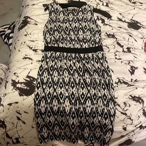 This is a classifies enrier 95% silk gorgeous dress.